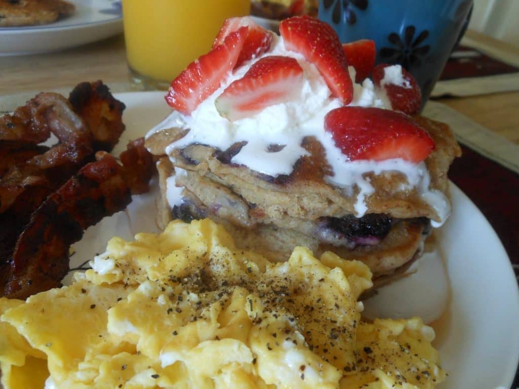 topped with fresh strawberries & whipped cream