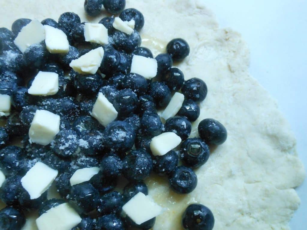 blueberries, honey, and butter sprinkled with sugar