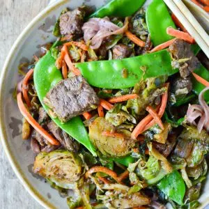 Beef and Brussels Sprouts Stir Fry with carrots and snap peas