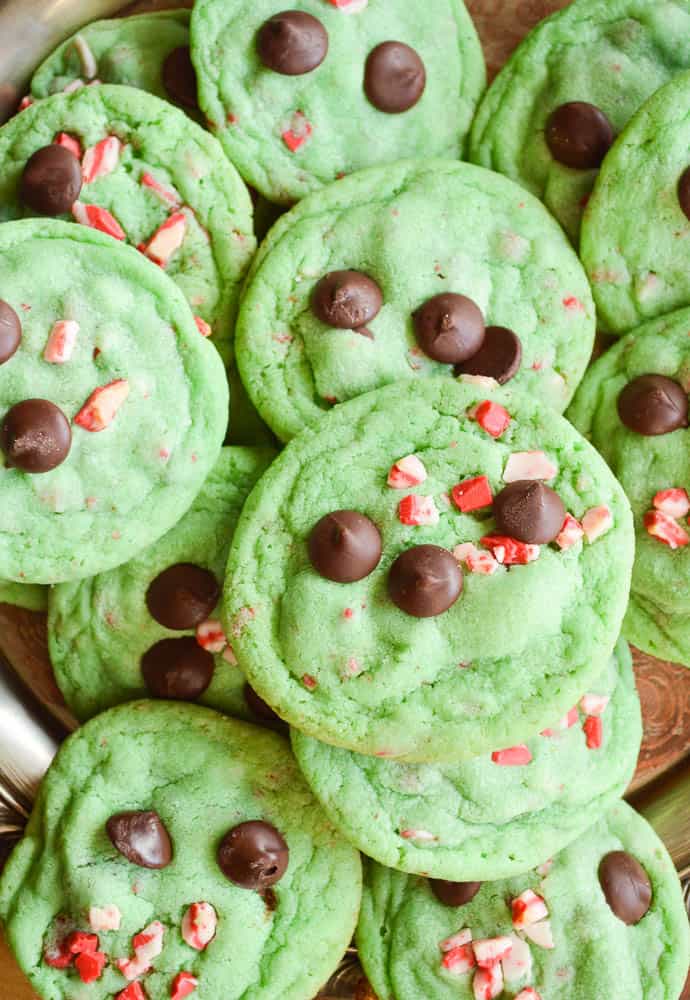 lapping so it's just a sea of cookies edge to edge. The Grinch Stole Christmas Cookies are soft minty green cookies studded with dark chocolate chips and peppermint chips! These are all spread out on a tray overp