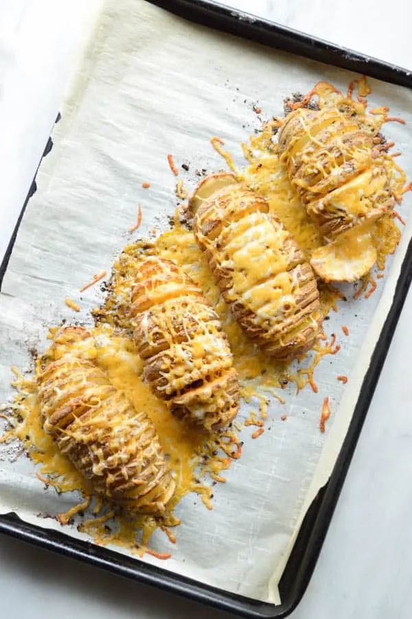 Chili Spiced Hasselback Potatoes covered in cheese