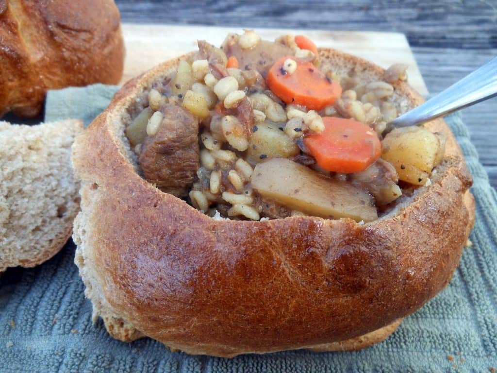 slow cooker beef, beer & barley stew in bread bowls