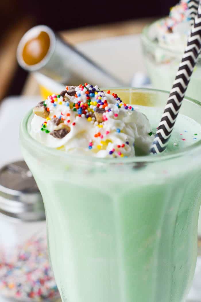 Green "shamrock" milkshake with rainbow sprinkles perfect for St. Paddy's Day!