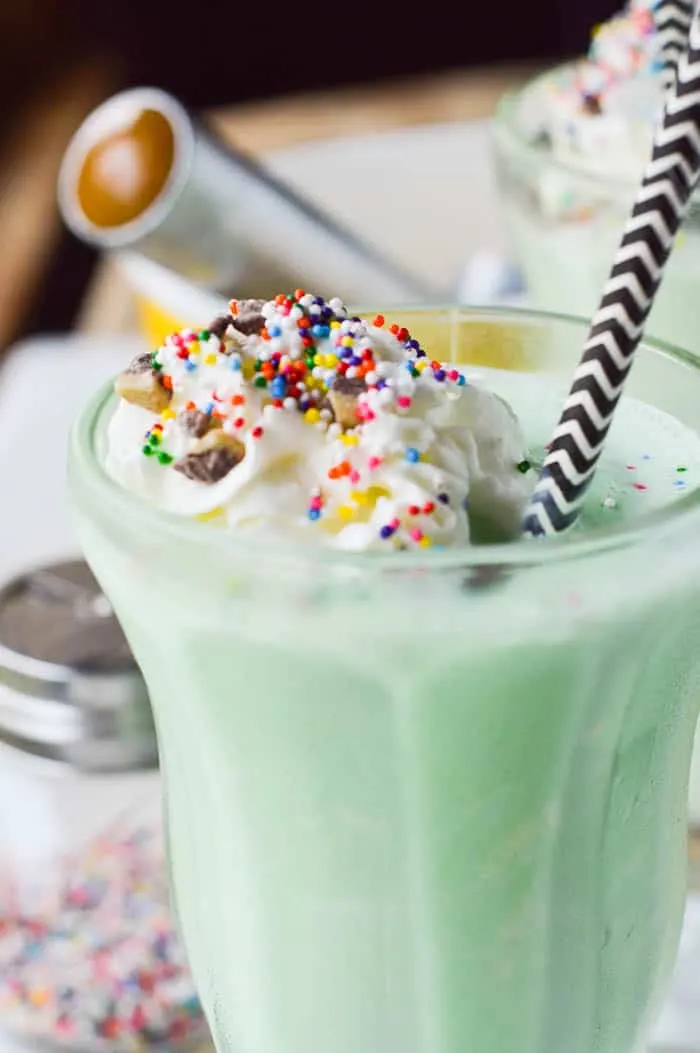 Green "shamrock" milkshake with rainbow sprinkles perfect for St. Paddy's Day!