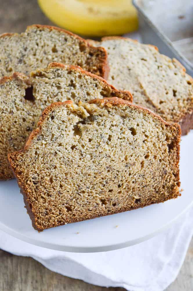 Biscoff Banana Bread sliced and stacked on a cake stand ready to eat