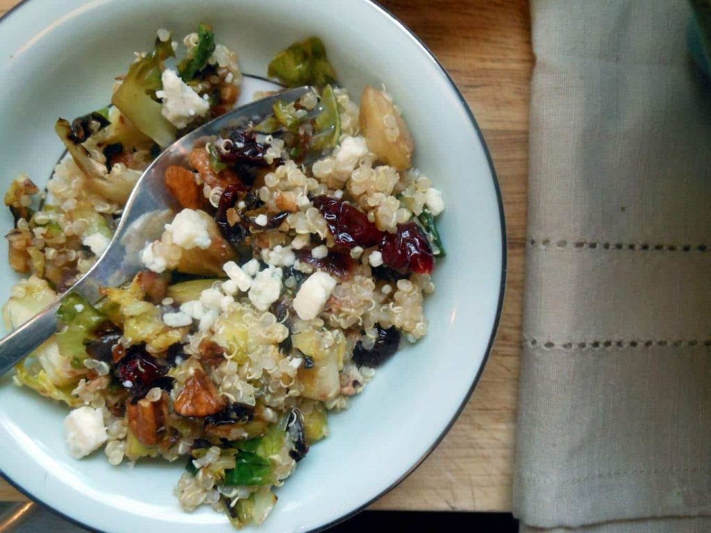 Warm Quinoa Salad with Brussels Sprouts + Cranberries + Pecans