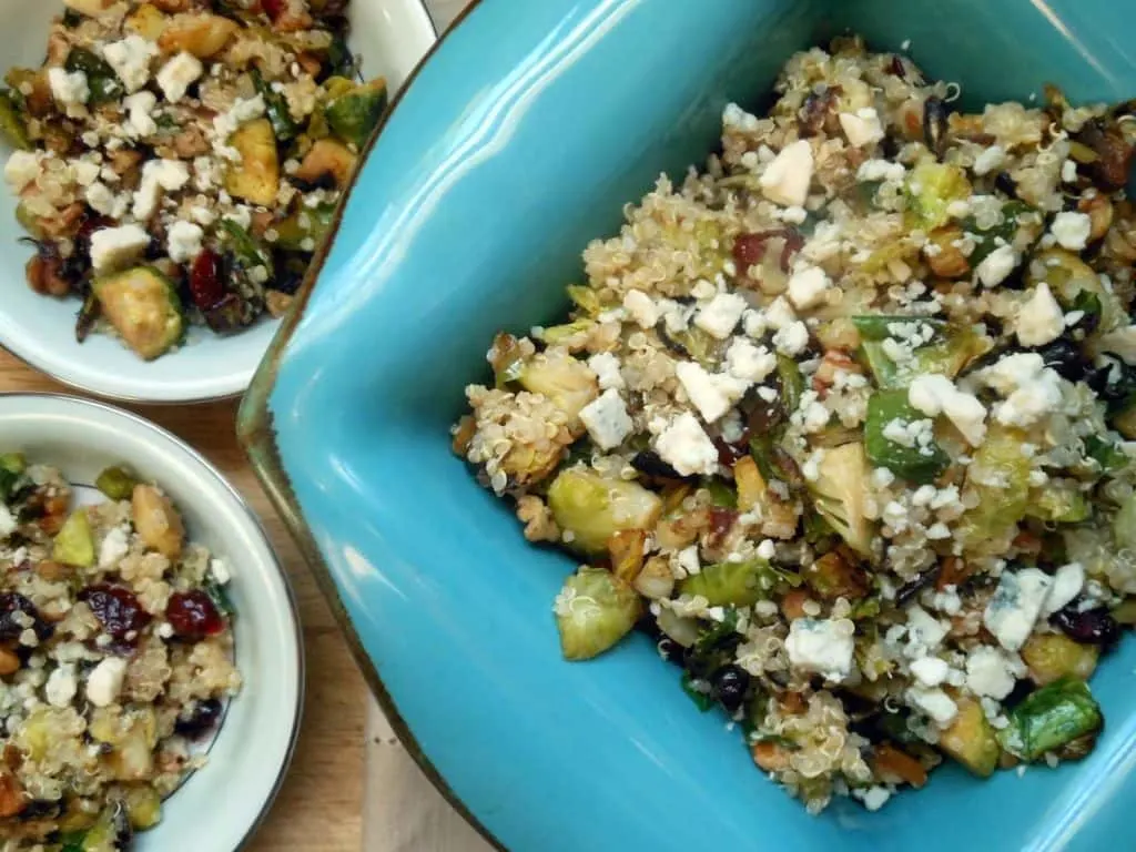 Warm Quinoa Salad with Brussels Sprouts + Cranberries + Pecans