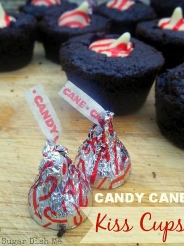 Candy Cane Kiss Cups; little soft chocolate brownie cookies topped with a candy can kiss!