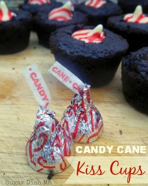 Candy Cane Kiss Cups; little soft chocolate brownie cookies topped with a candy can kiss!