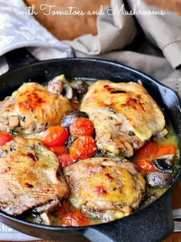 Roasted Chicken Thighs with Tomatoes and Mushrooms via Will Cook for Smiles; Meal Plans Made Simple