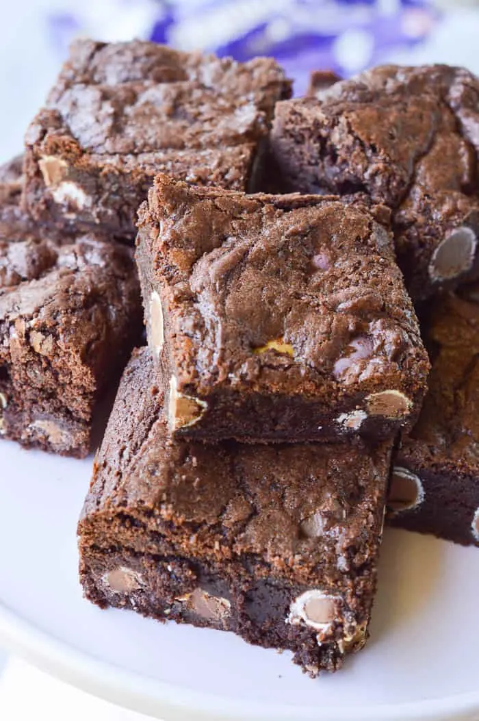 A pile of the thickest, fudgeiest Cadbury Candy Egg Brownies studded with Cadbury Candy Mini Eggs