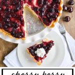 Overhead view of a cheesecake pie covered in cooked cherries and berries image with text.