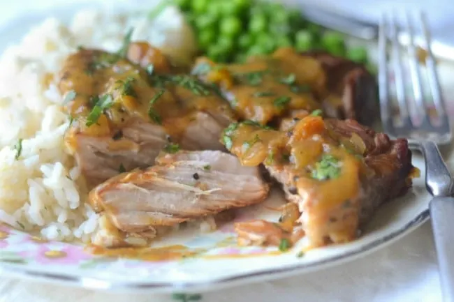 Slow Cooker Peach BBQ Smothered Pork Chops