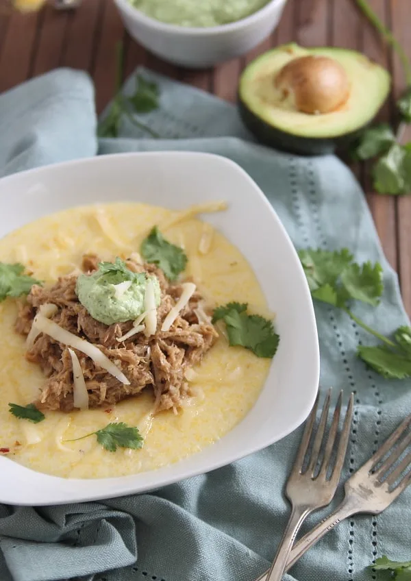 Slow Cooker Balsamic Pulled Pork with Polenta and Avocado Cream via Running to the Kitchen