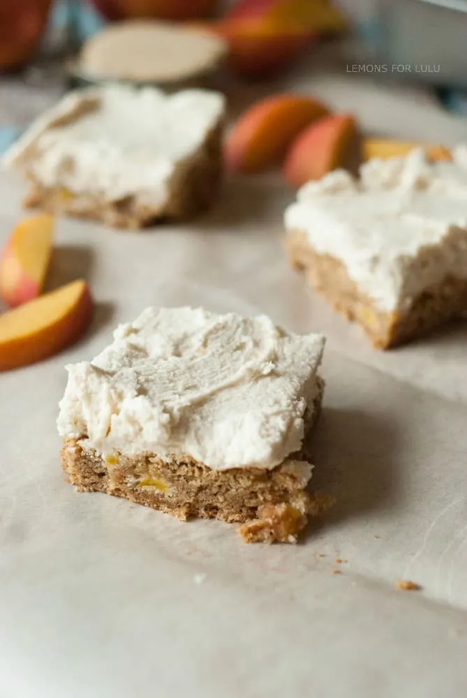 Peach Cake Bars with Brown Sugar Frosting via Lemons for Lulu