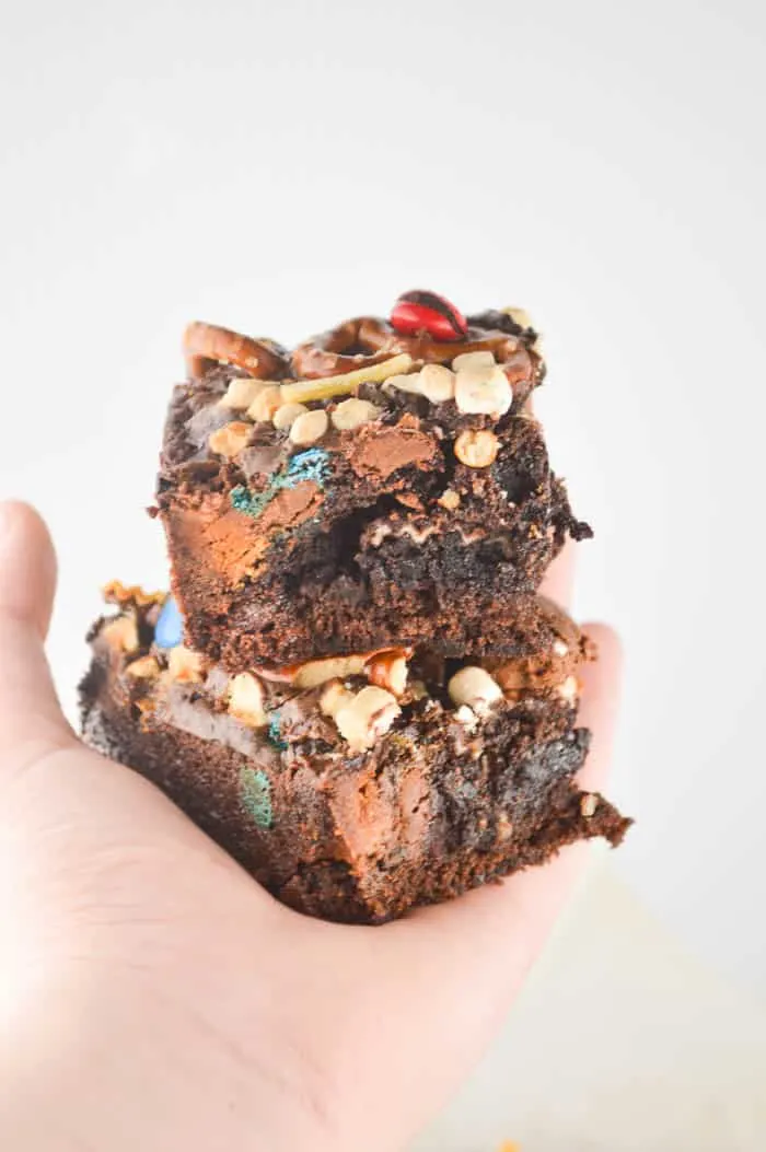 Kitchen Sink Brownies loaded with salty pretzels and chips, and sweet candies and chocolate!