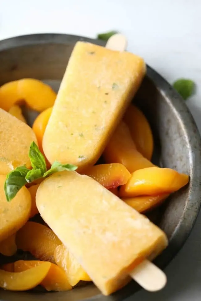 Basil Peach Margarita Popsicles via Lemons for Lulu