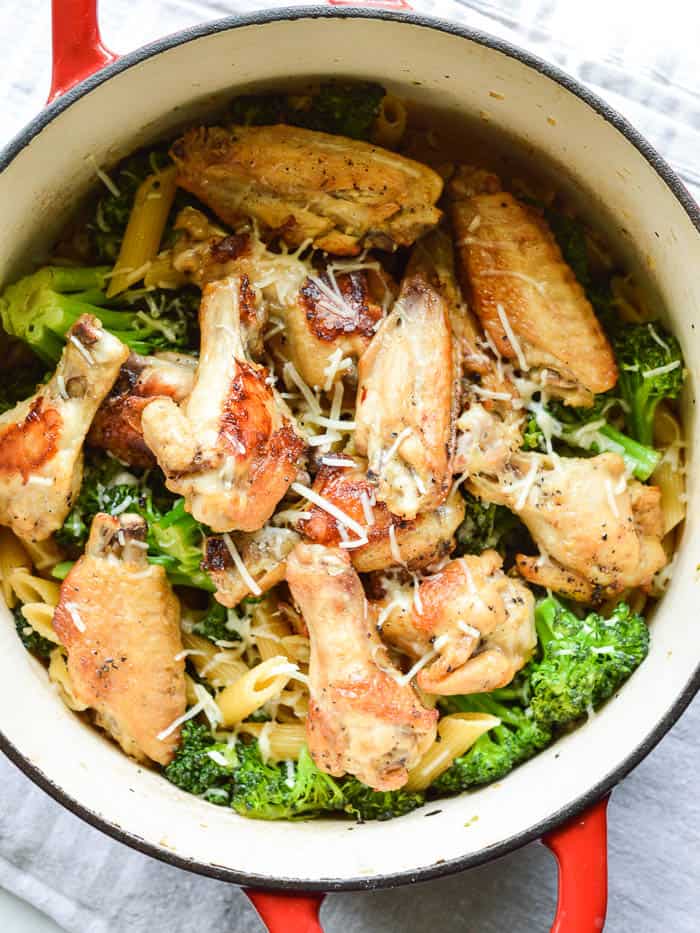 One Pot Garlic Chicken Thighs with Broccoli in a dutch oven