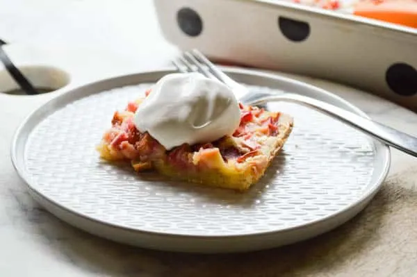 These rhubarb squares are so simple to make! The cookie crust and custard filling require just a few pantry staples!