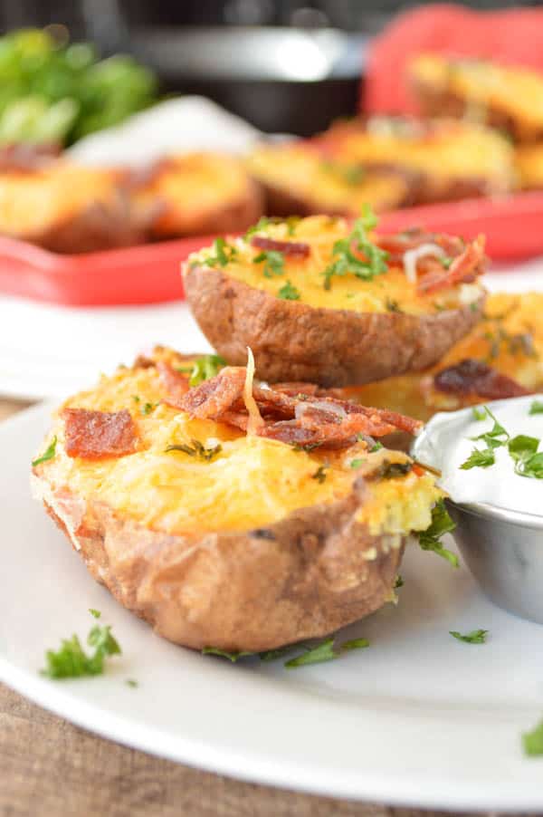 Twice Baked Breakfast Potatoes with bacon., plated and sprinkled with parsley