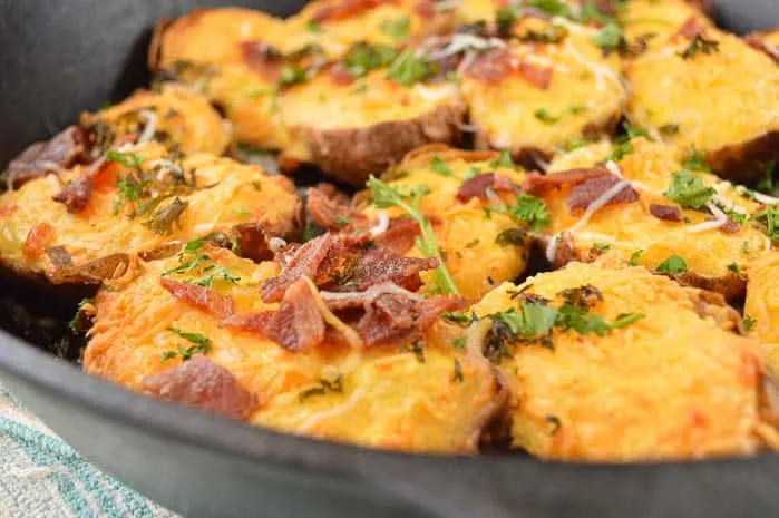 Twice Baked Breakfast Potatoes straight from the oven in a cast iron skillet