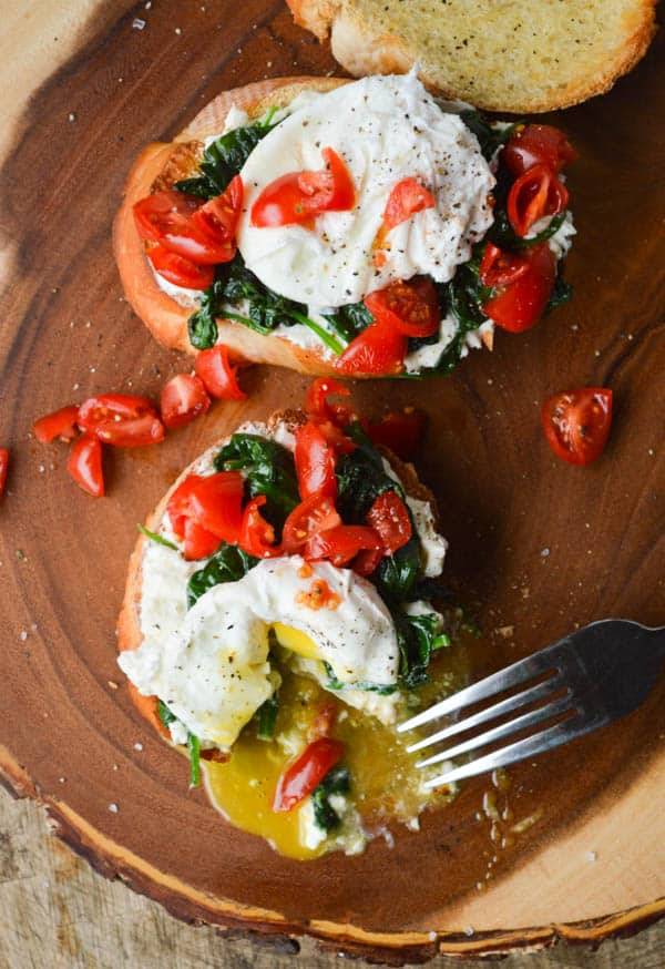 Whipped Feta Crostini with a perfect runny poached egg