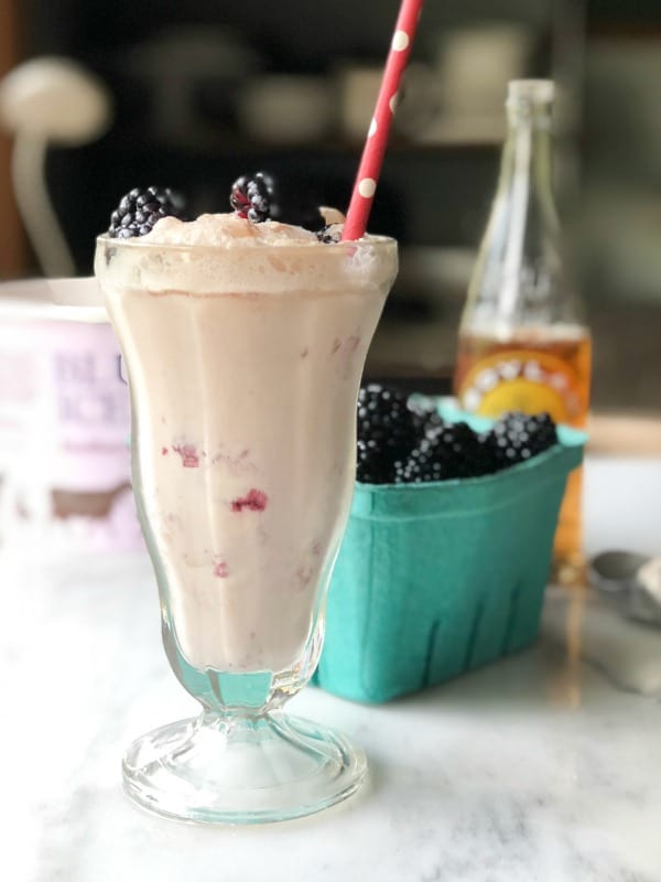 This Blackberry Cream Float is the perfect way to serve up summer. Southern Blackberry Cobbler Ice Cream, Boylan Creme Soda, and fresh blackberries in a fountain glass. 