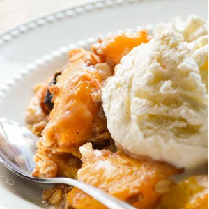 Slow Cooker Boozy Peach Cobbler