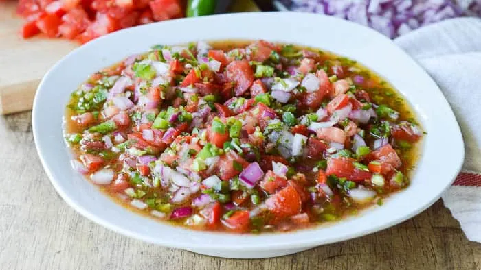 Easy Pico de Gallo in a white dish ready for serving