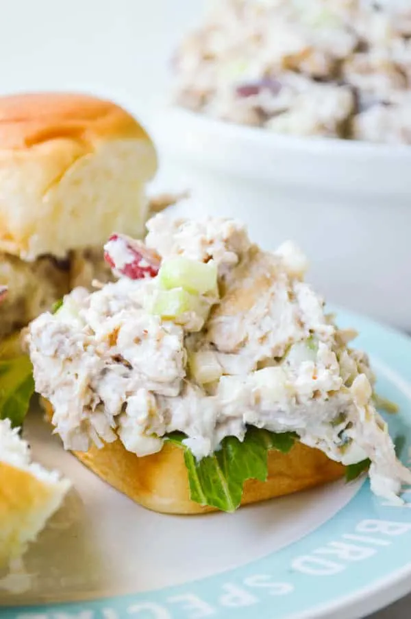 Soft Hawaiian rolls topped with the best rotisserie chicken salad loaded up with celery apples, grapes, and more