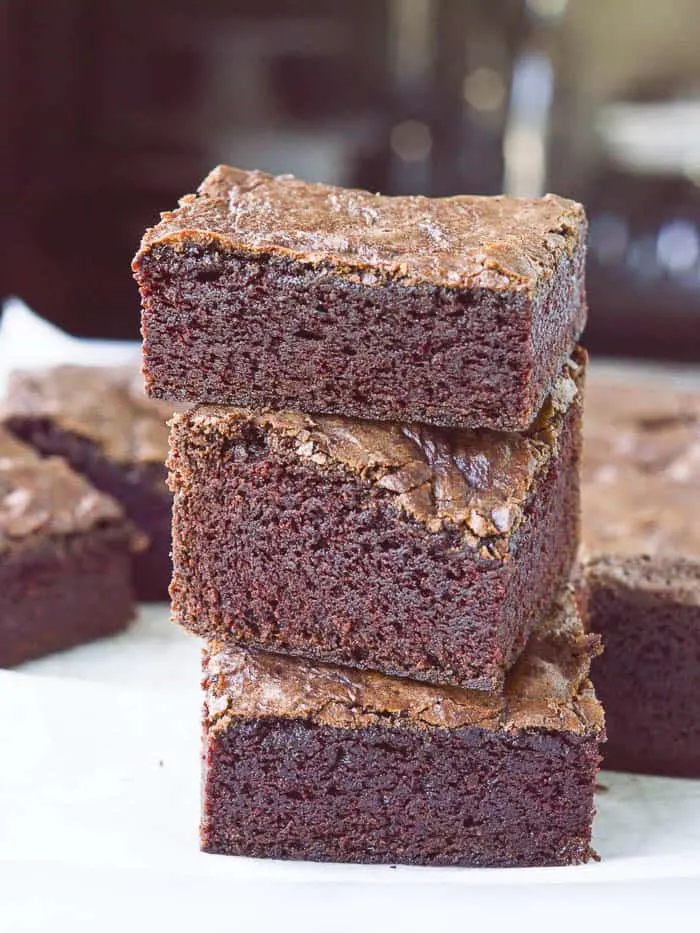 a stack of thick, fudgy homemade brownies that are perfect for sundaes